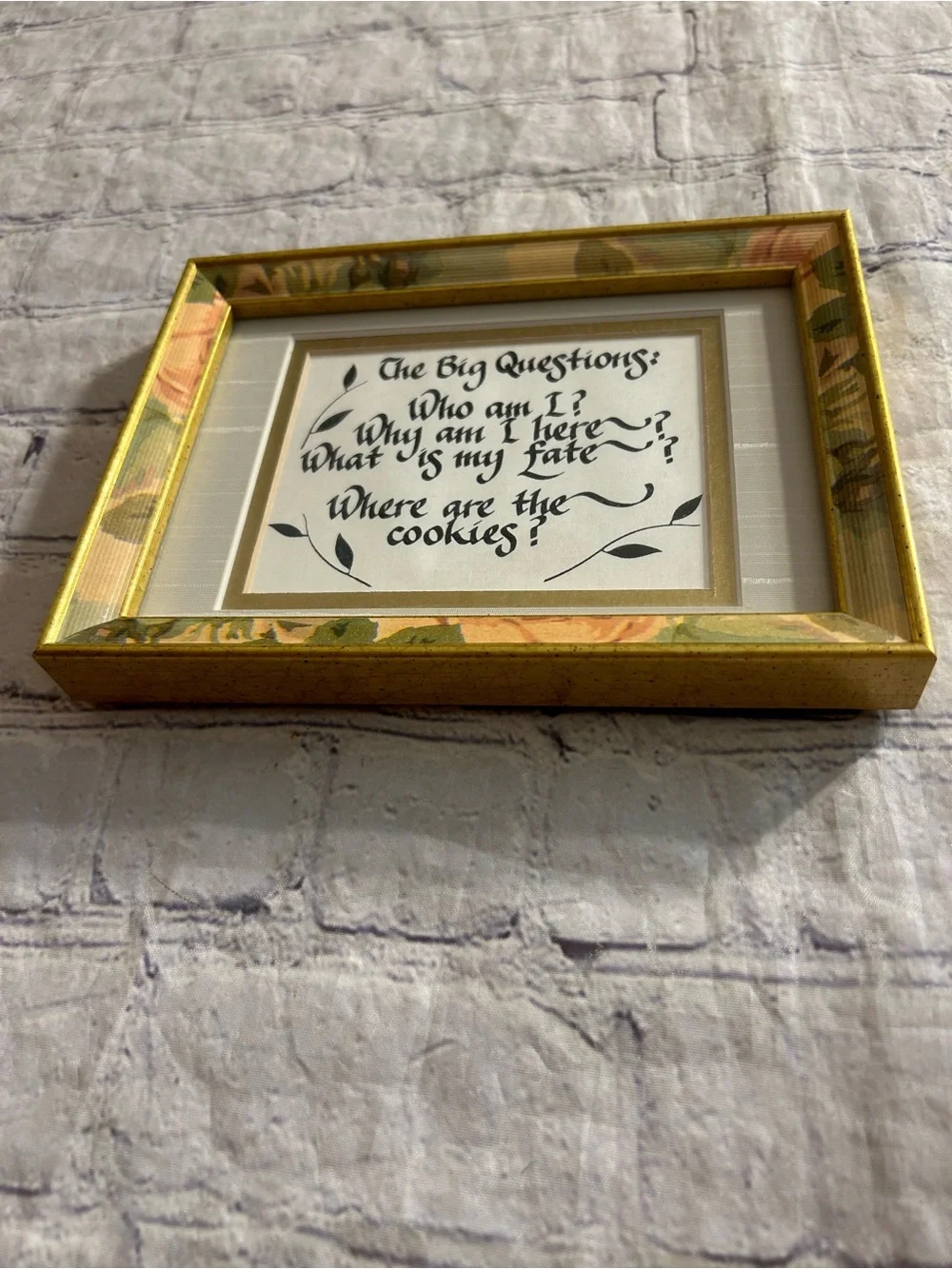 FRAMED CALLIGRAPHY HUMOROUSLY LISTS THE BIG QUESTIONS OF LIFE FLORAL FRAME
